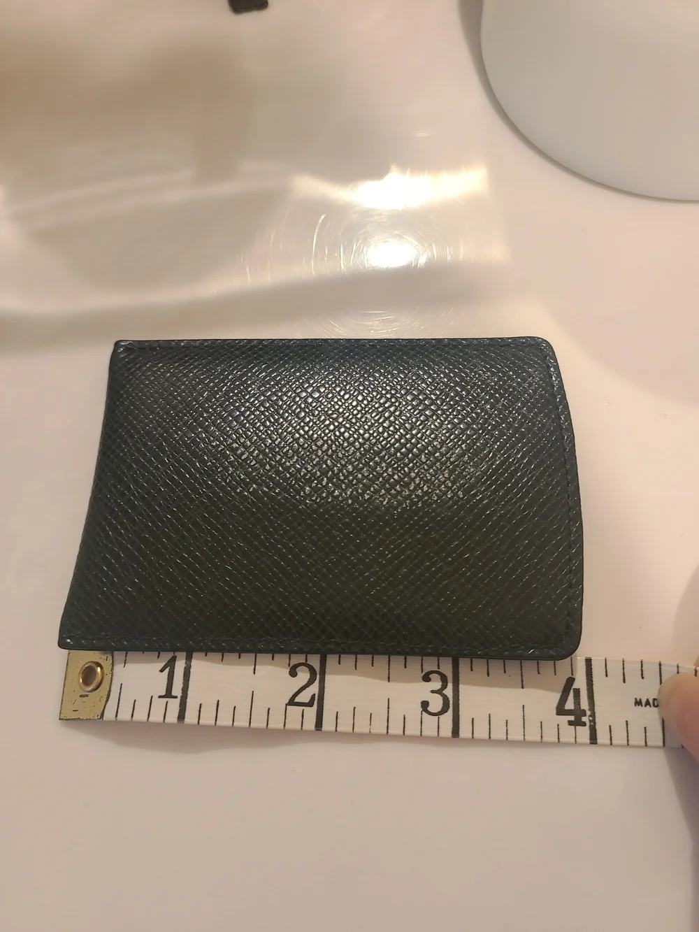 Authentic Louis Vuitton card holder in Taiga leather